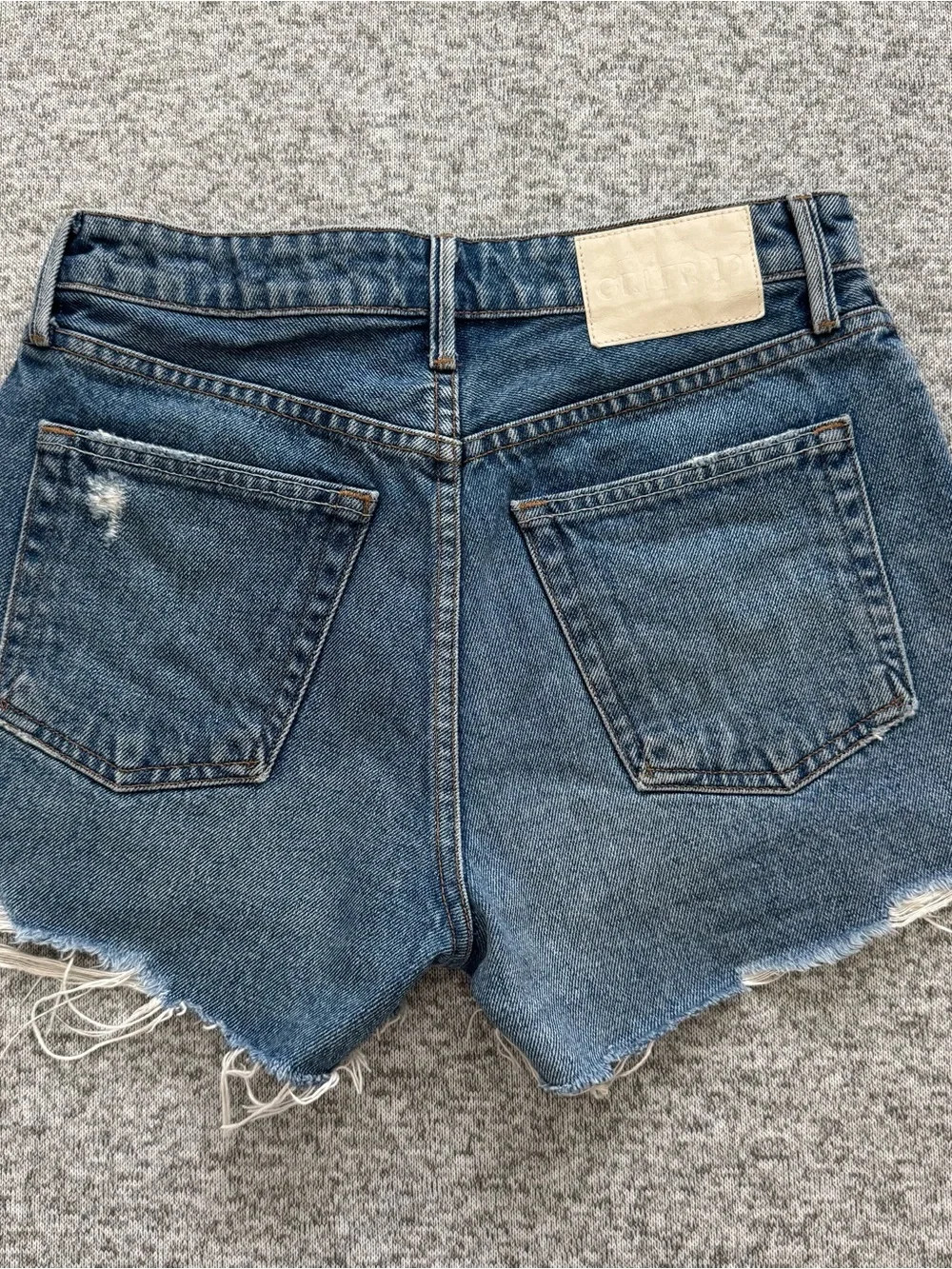 GRLFRND Raw-Hem Distressed Blue Denim Shorts